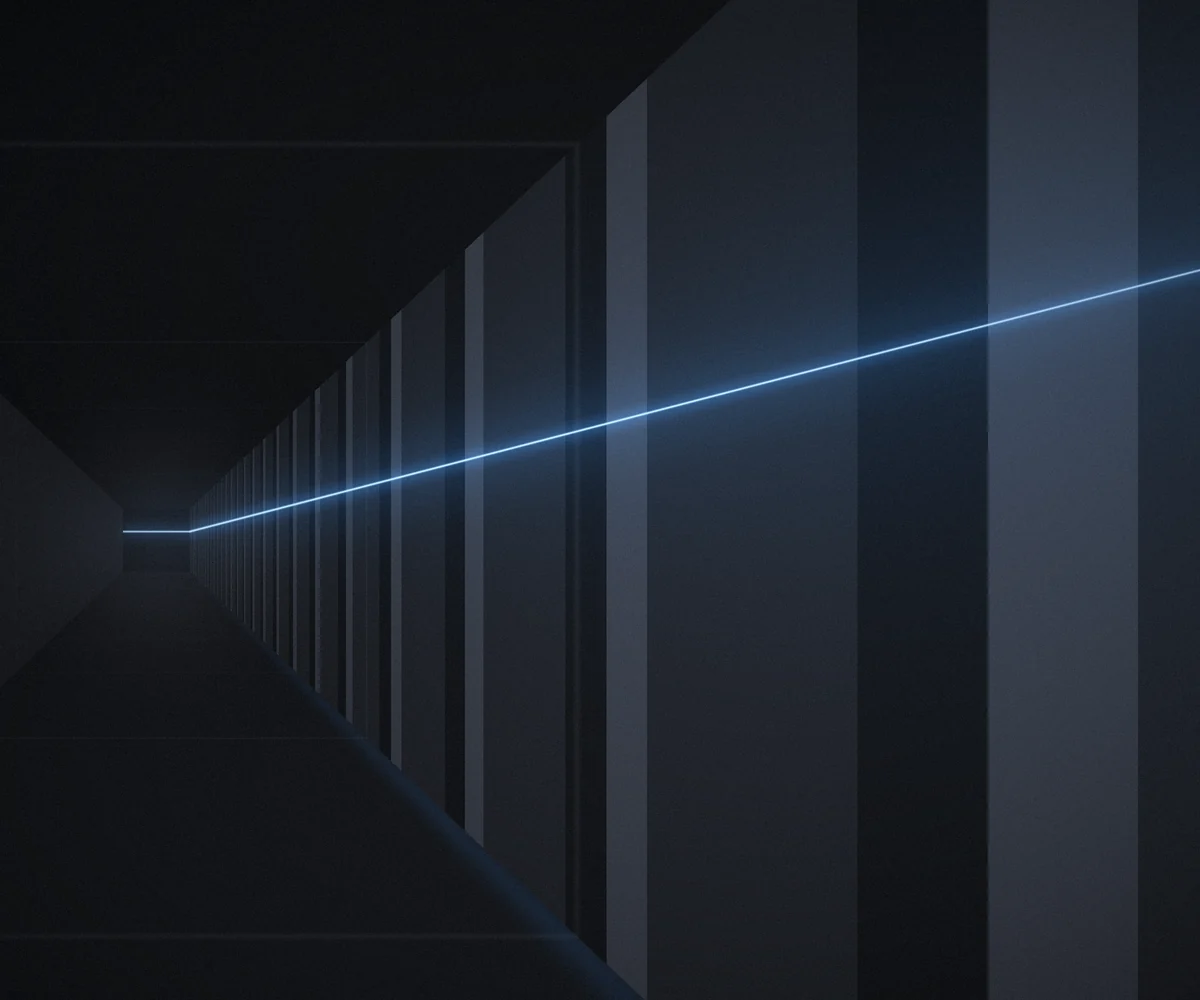 Architectural fins along a gallery wall, joined by a continuous blue line of light